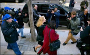 The media horde spies Susan Lindauer in New York after a court appearance last week (March 11, 2004).