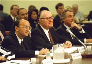 In this 1993 file photo, Richard Grasso of the New Stock Exchange, left, ex-SEC chief David S. Ruder, center, and Bernard Madoff appear before a House panel. (AP Photo)